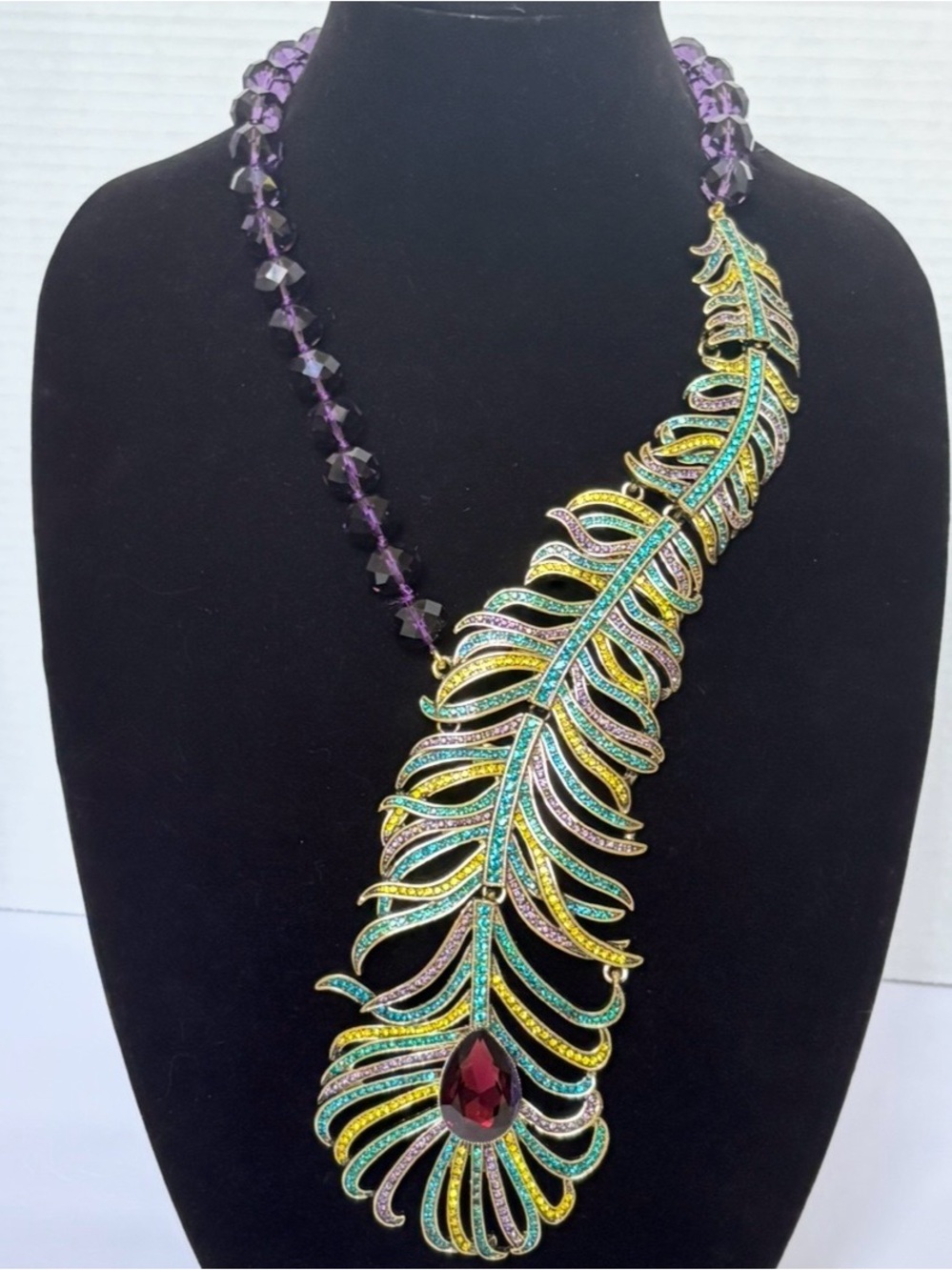 Heidi Daus Peacock Feather Statement Piece